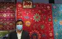 阿富汗在進博會爆紅：12萬罐松子秒光，3.5噸“飛來”毯有故事